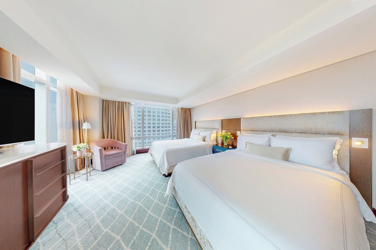 Classic Room, 2 Queen Beds | Minibar, in-room safe, desk, laptop workspace