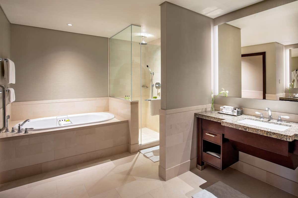 Separate tub and shower, deep soaking tub, rainfall showerhead