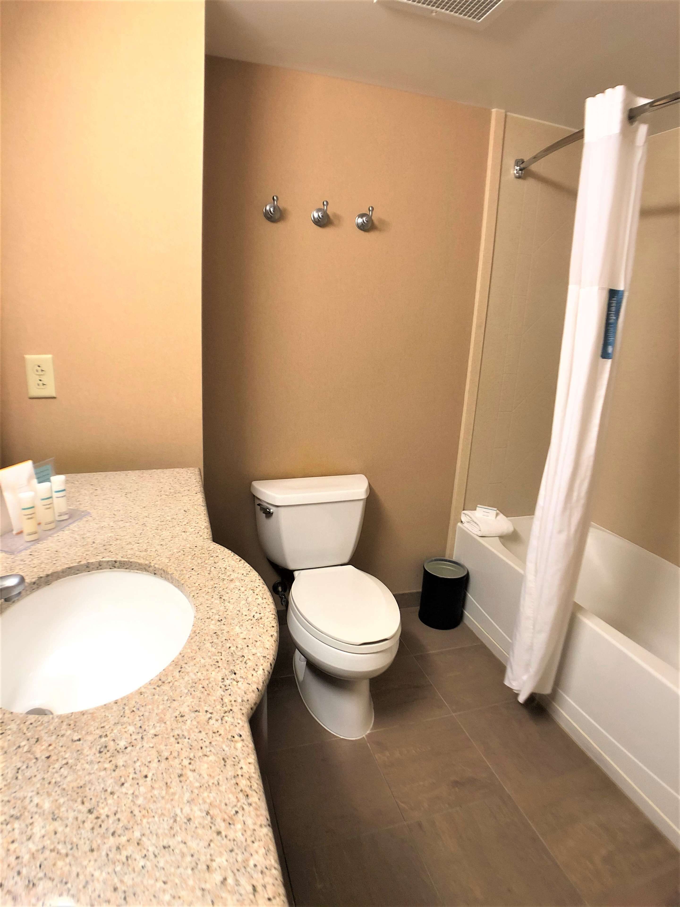 room, 2 queen beds, non smoking | bathroom | combined shower/bathtub, free toiletries, hair dryer, bathrobes