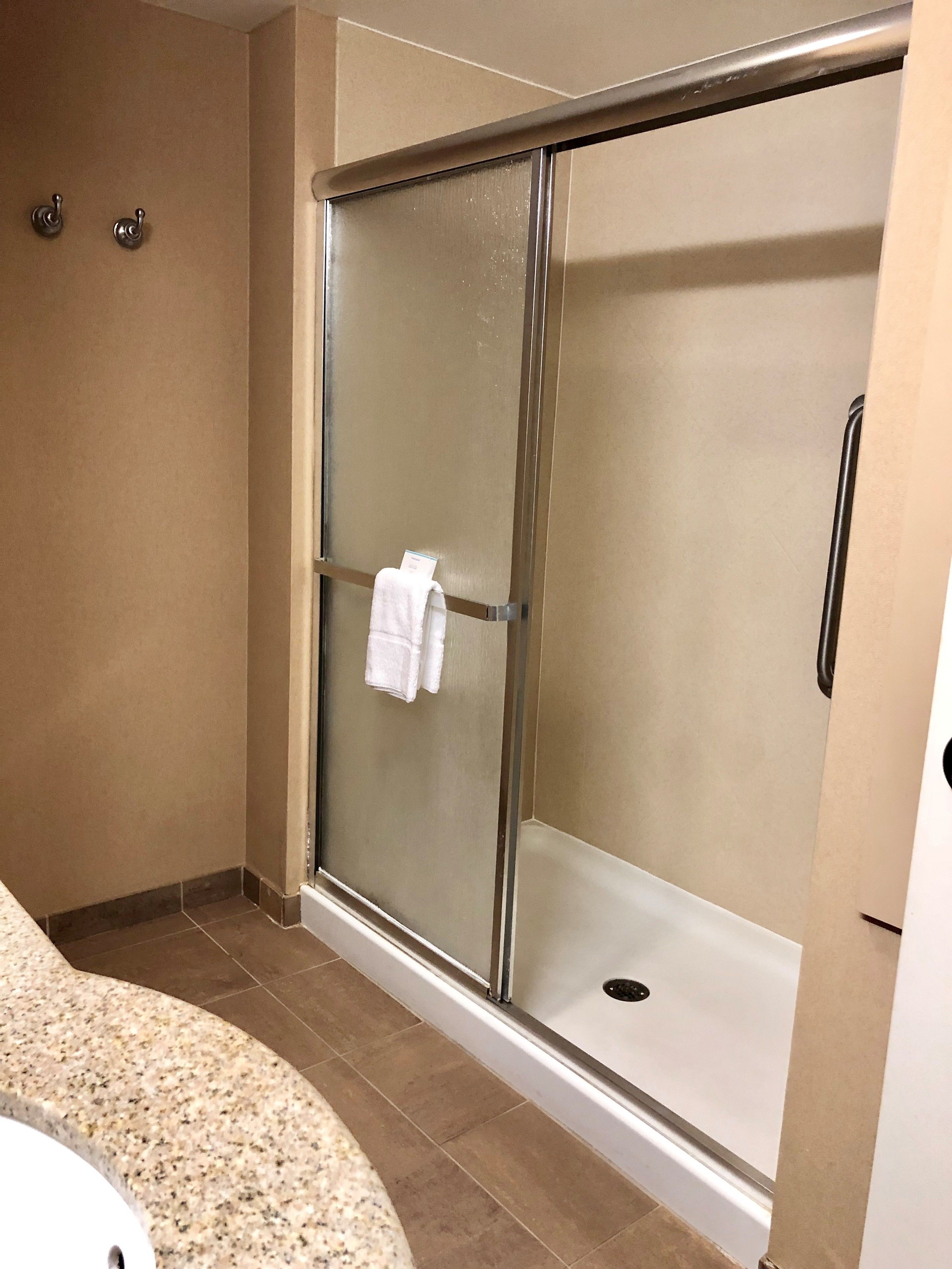 room, 1 king bed | bathroom | combined shower/bathtub, free toiletries, hair dryer, bathrobes