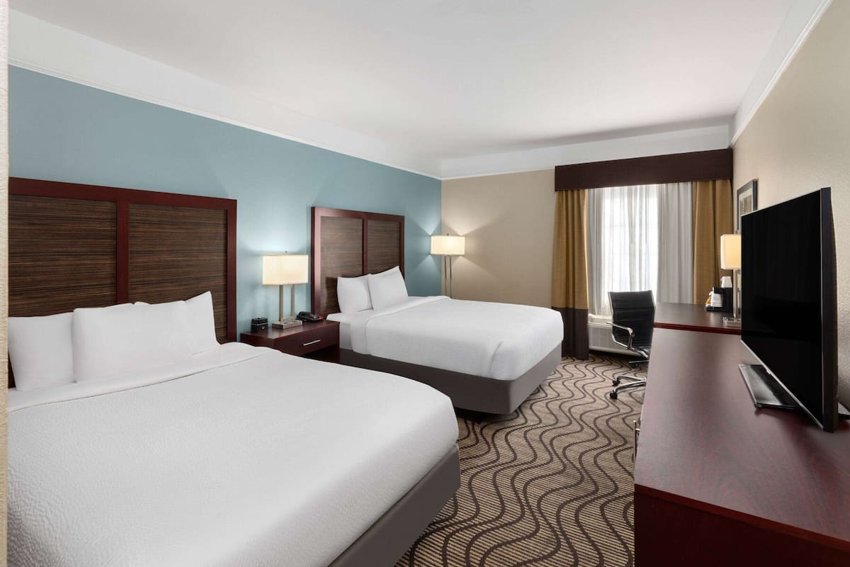 Room, 2 Queen Beds, Non Smoking | Desk, iron/ironing board, free WiFi, bed sheets