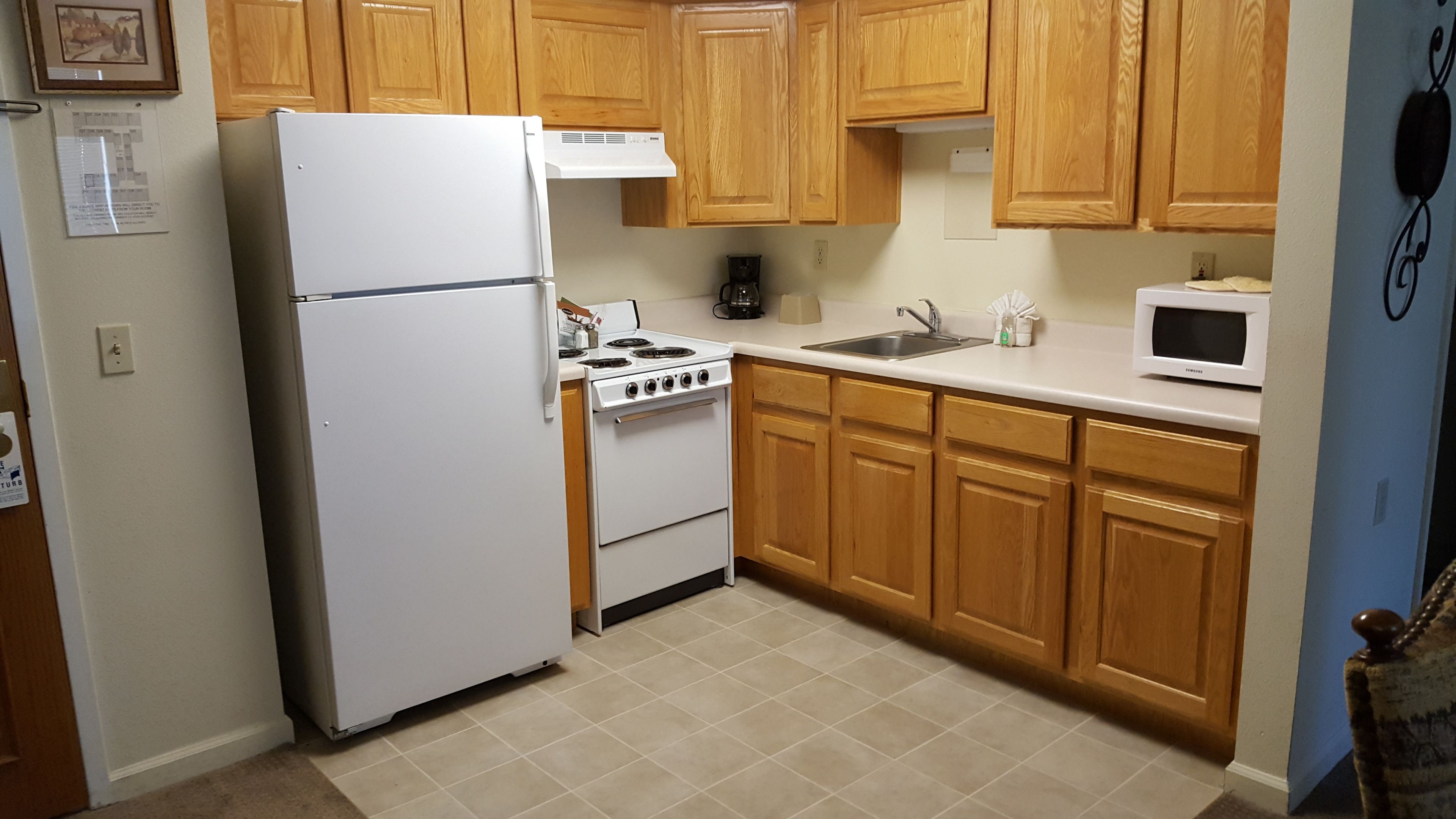 studio suite, 1 queen bed | private kitchen | full-sized fridge, microwave, oven, stovetop