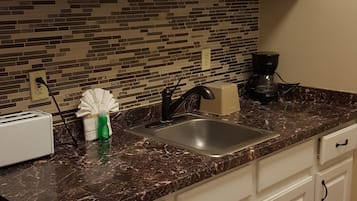 Suite, 2 habitaciones | Cocina privada | Refrigerador con congelador, microondas, horno y parrilla de estufa