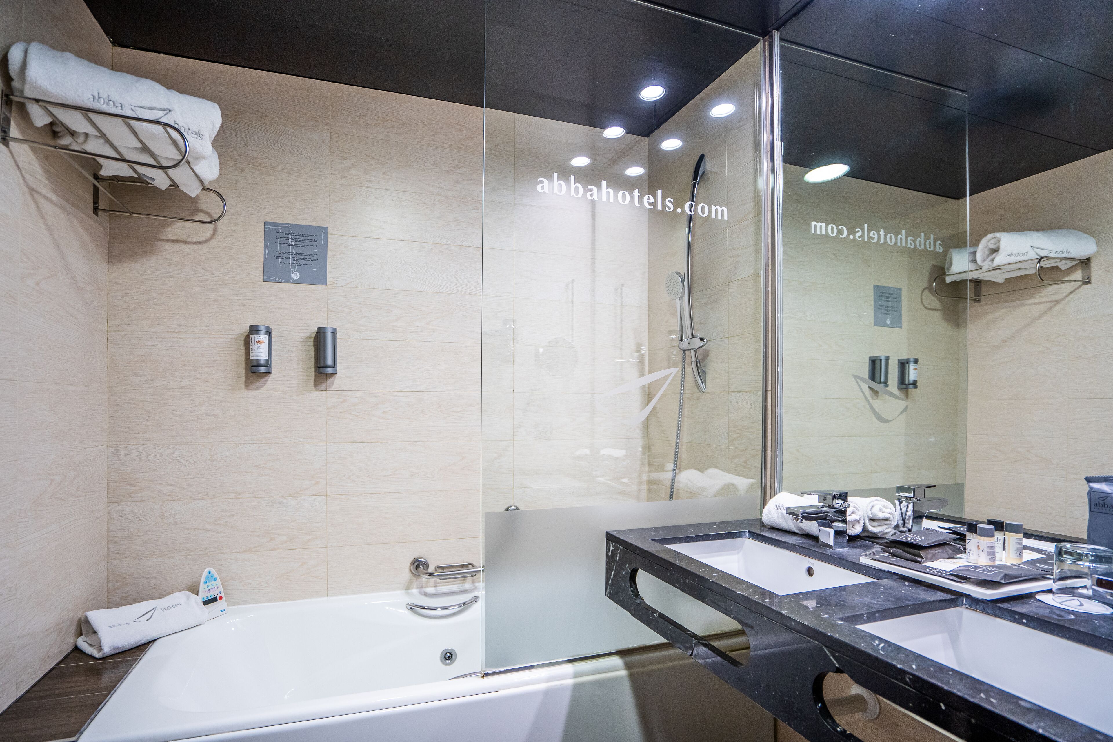 eco-friendly toiletries, hair dryer, towels, soap