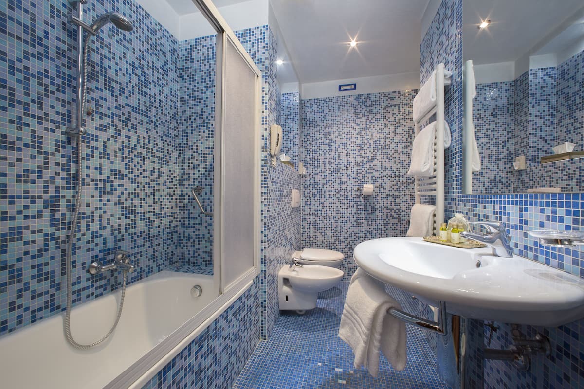 standard double or twin room | bathroom | free toiletries, hair dryer, slippers, towels