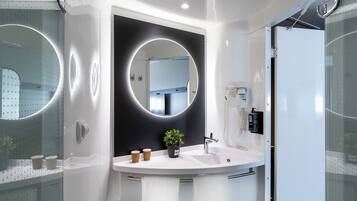 Shower, eco-friendly toiletries, hair dryer, towels