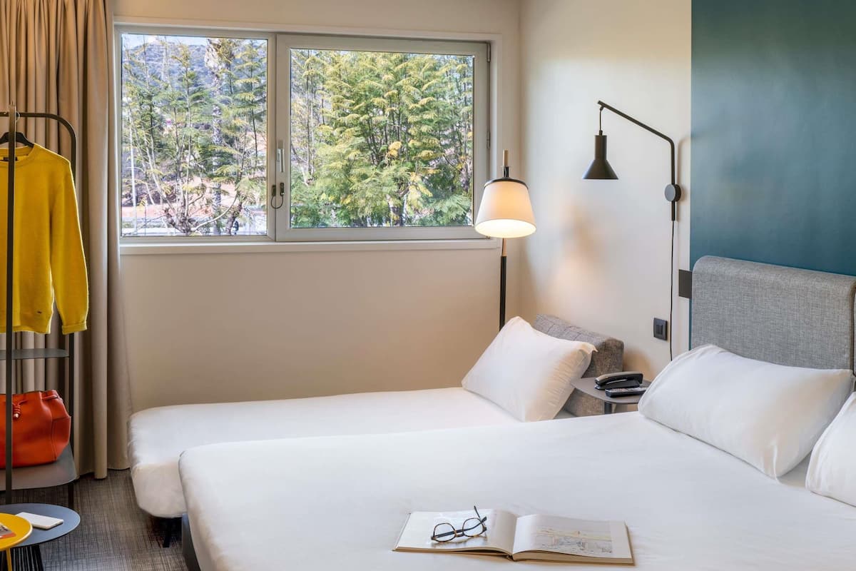 Hypo-allergenic bedding, down comforters, desk, laptop workspace