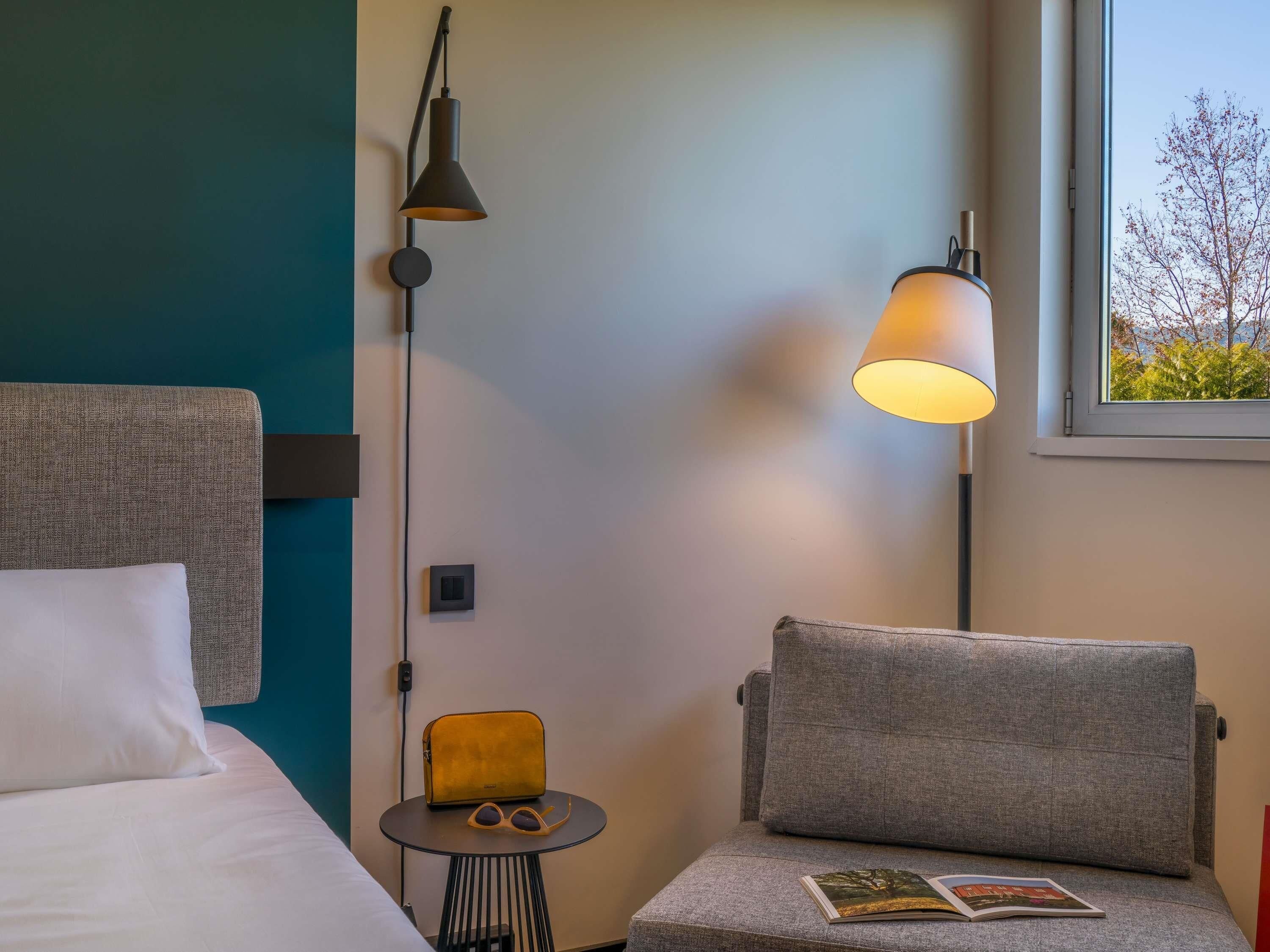 Hypo-allergenic bedding, down duvets, desk, laptop workspace