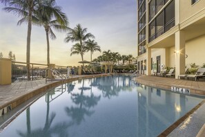 Outdoor pool, a heated pool, sun loungers