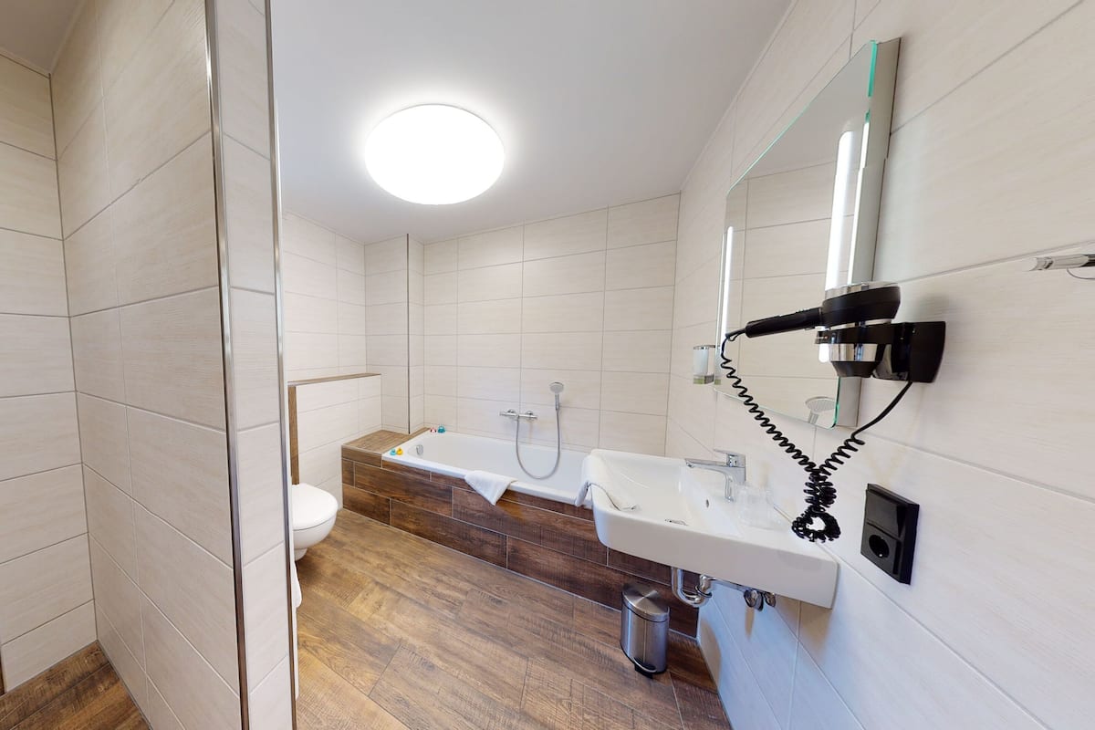 Bathroom | Hair dryer, towels, soap, shampoo