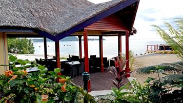 Lunch, dinner served; Fusion cuisine, beach views