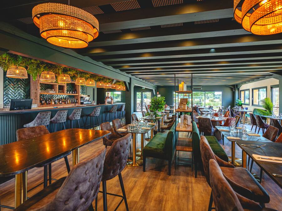 Lunch, dinner served; French cuisine, golf course views