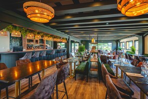 Lunch, dinner served; French cuisine, golf course views 