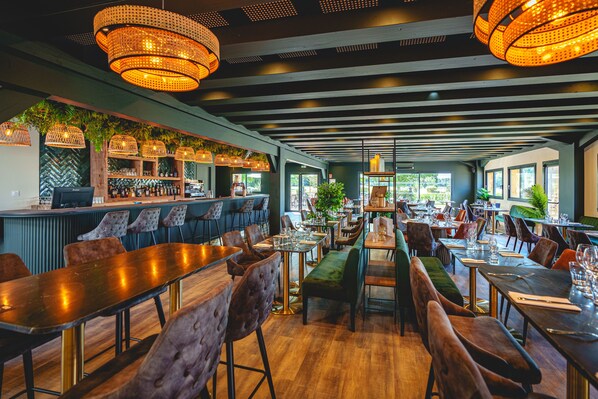 Lunch, dinner served; French cuisine, golf course views 