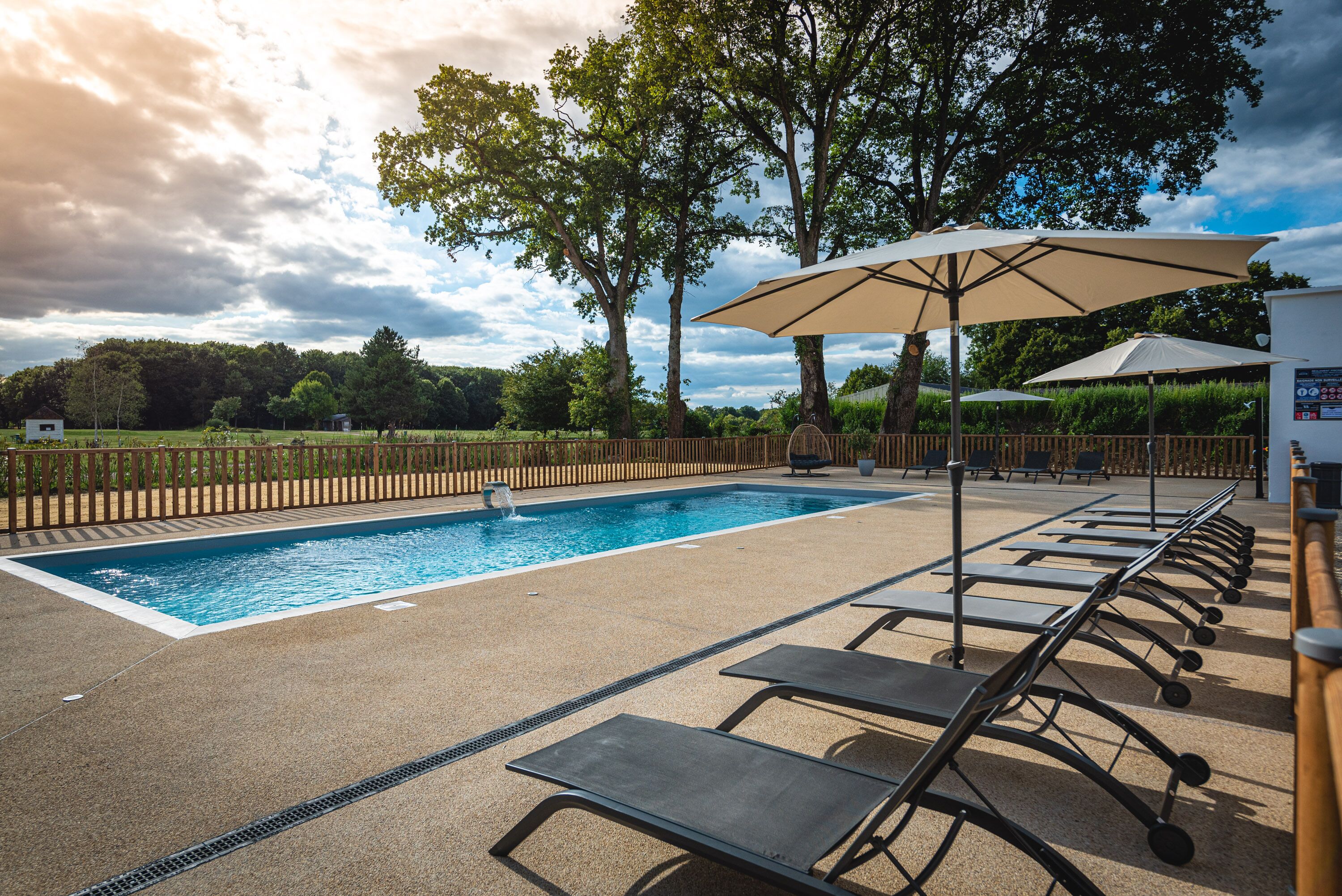 outdoor pool, pool loungers