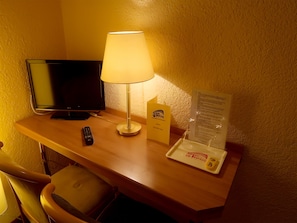 Hypo-allergenic bedding, down duvets, pillow-top beds, in-room safe