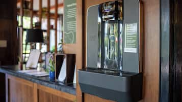 A bottle refilling station with a label indicating it is a GLOBAL INDUSTRIAL product.