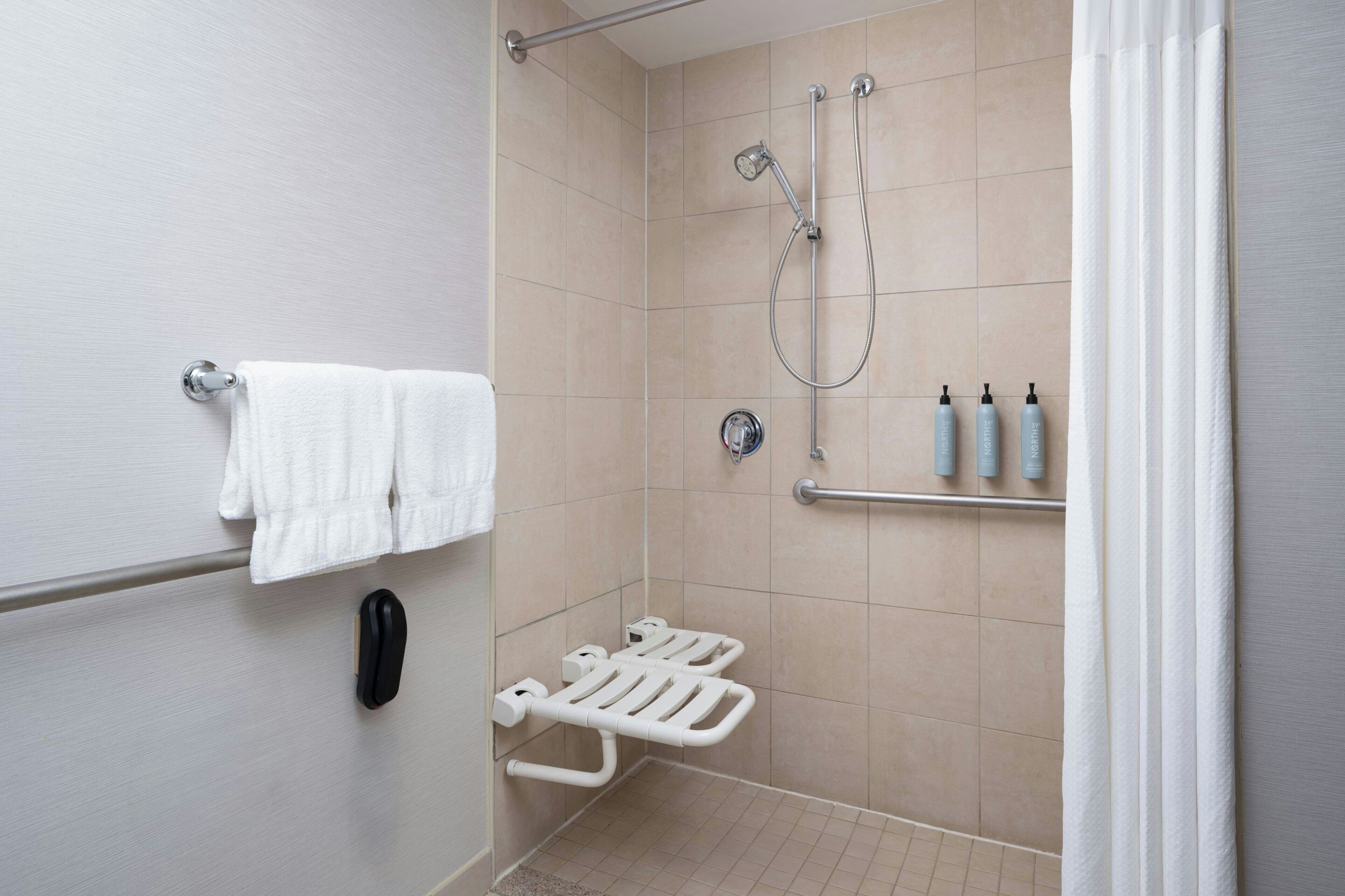 combined shower/bathtub, free toiletries, hair dryer, towels
