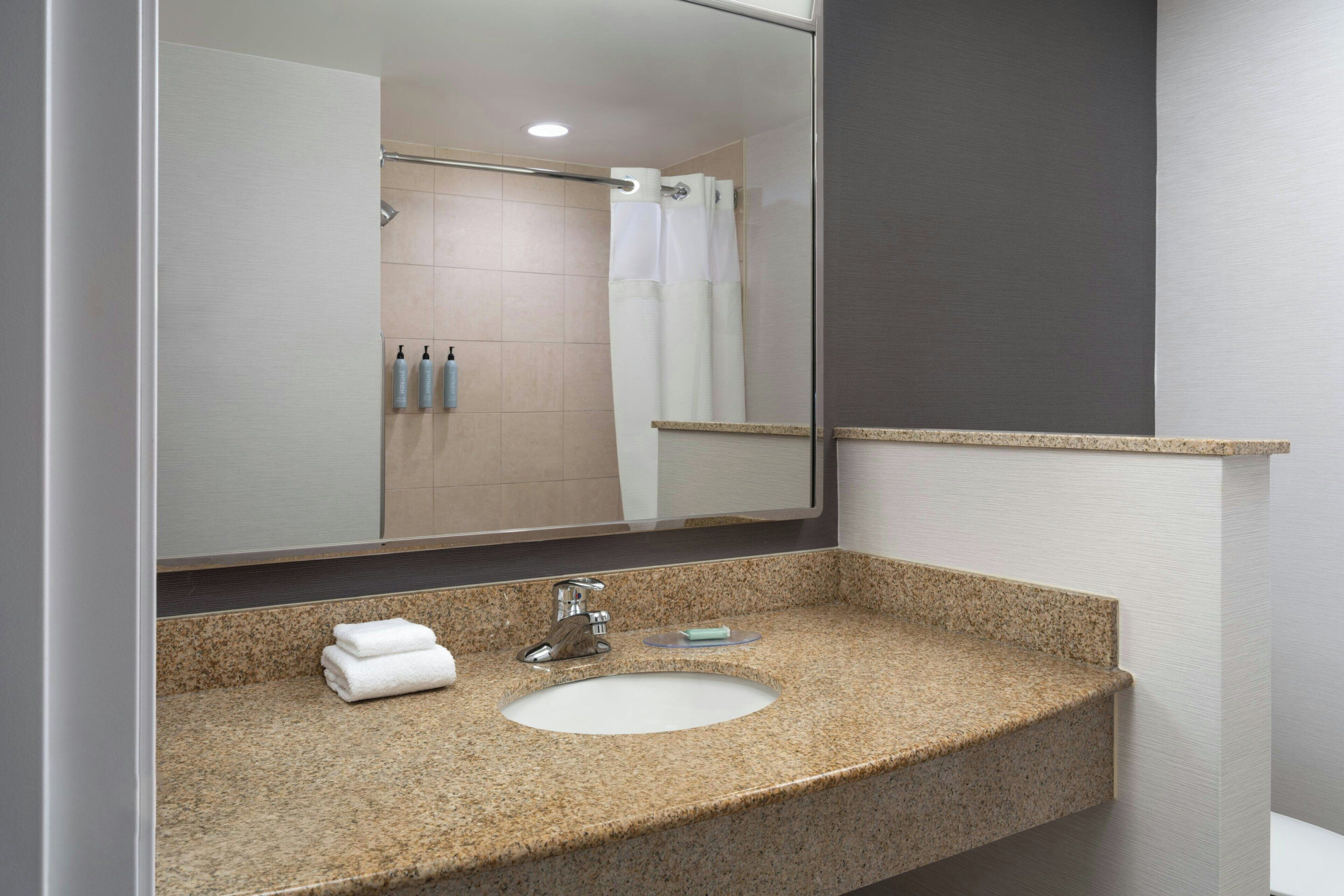 combined shower/bathtub, free toiletries, hair dryer, towels