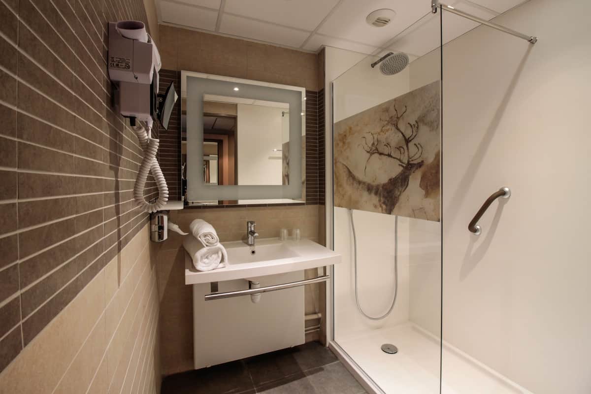 shower, eco-friendly toiletries, hair dryer, towels