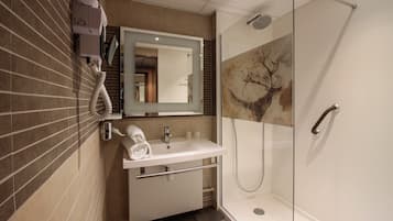 Shower, eco-friendly toiletries, hair dryer, towels