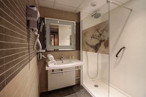 Shower, eco-friendly toiletries, hair dryer, towels