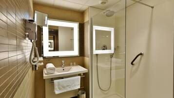 Shower, eco-friendly toiletries, hair dryer, towels