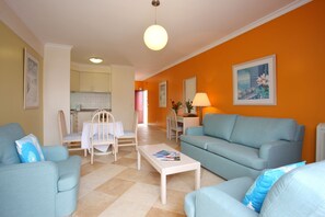 Suite Junior | Aire de séjour | Téléviseur