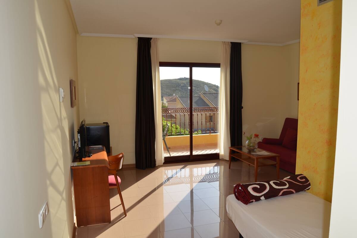 Blackout curtains, free WiFi, bed sheets