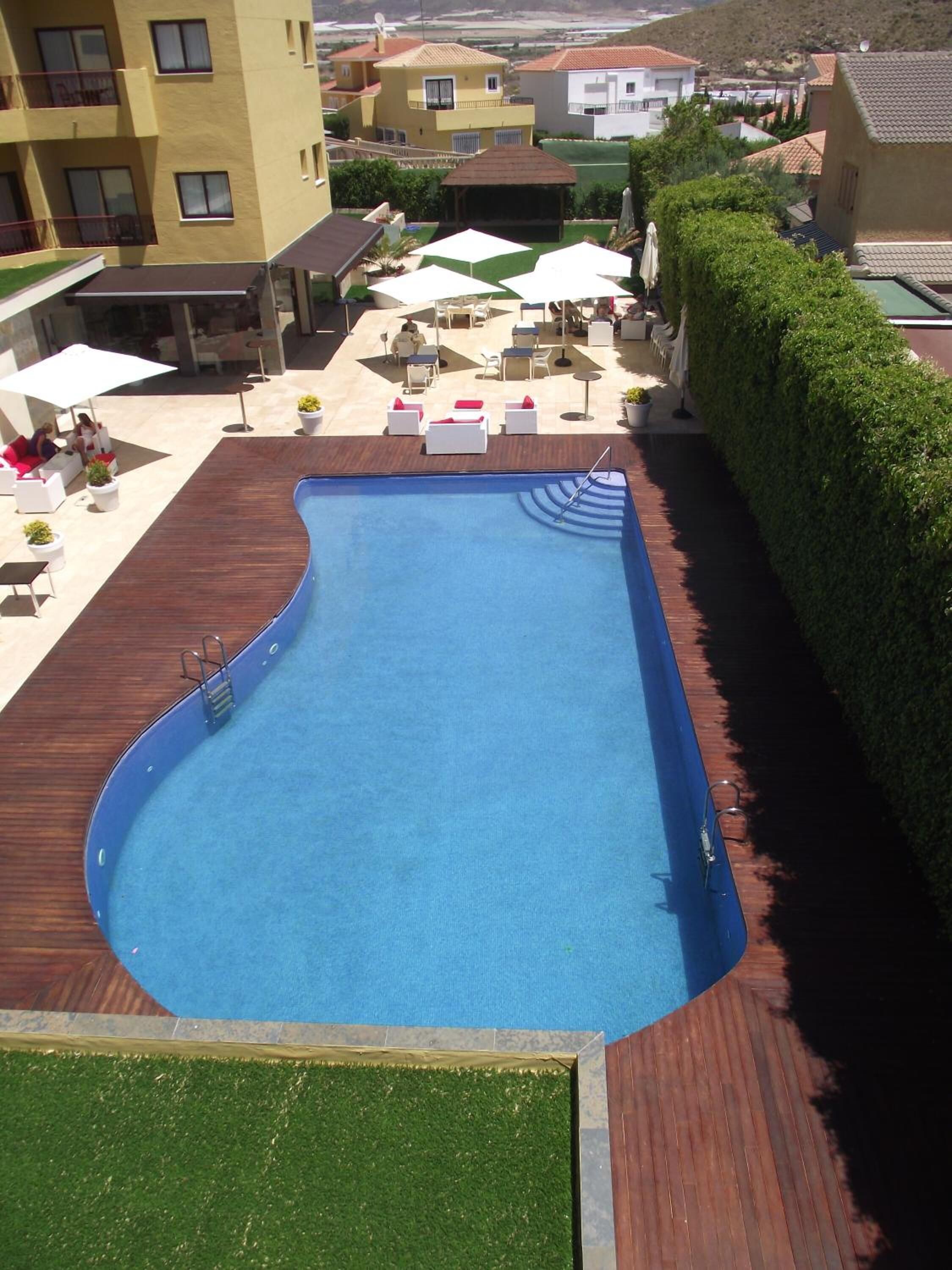 seasonal outdoor pool, pool loungers