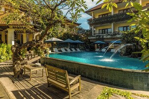 2 outdoor pools, open 9:00 AM to 7:30 PM, pool umbrellas, pool loungers