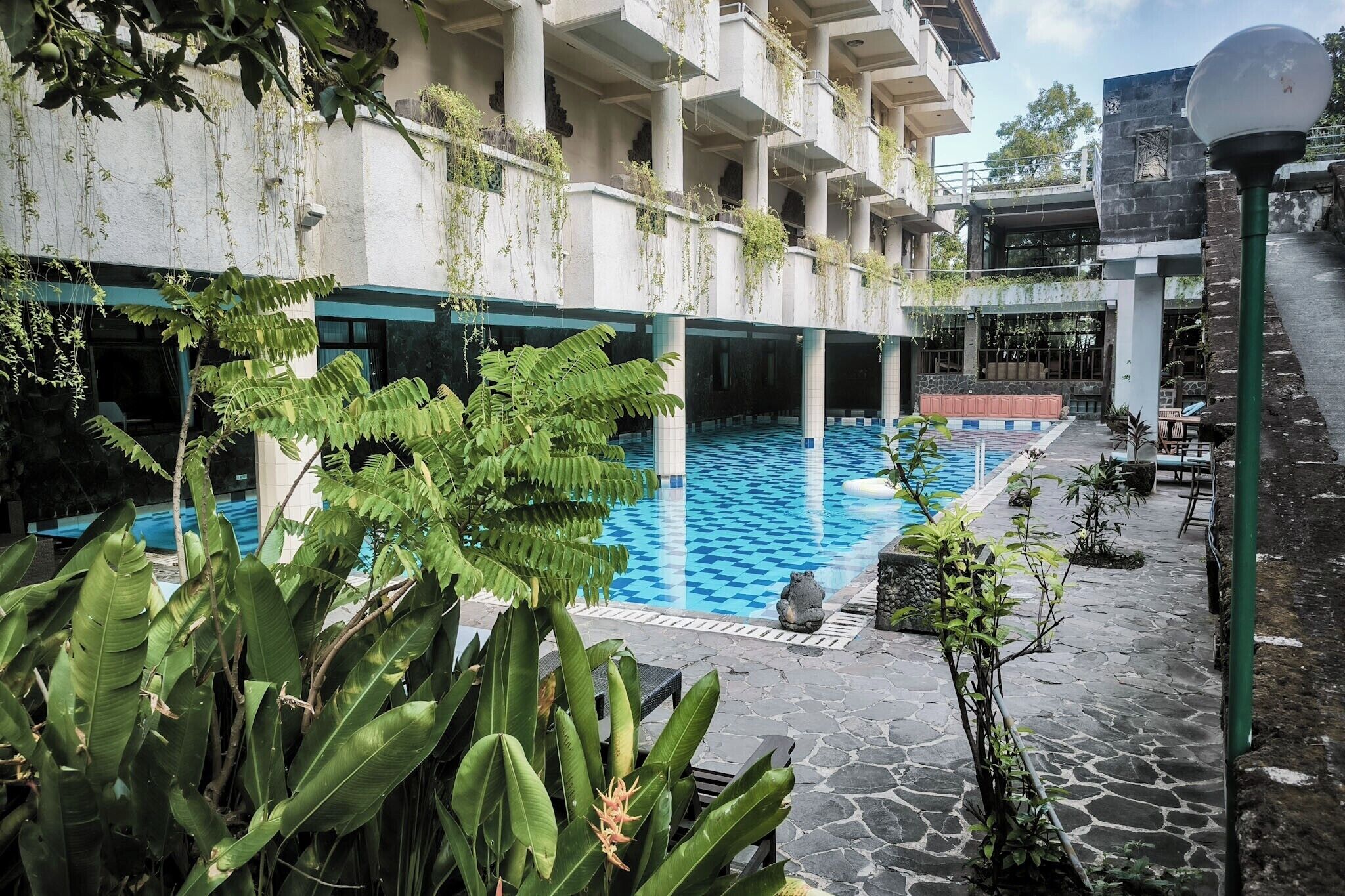 2 outdoor pools, open 6:00 AM to 8:00 PM, pool umbrellas, pool loungers