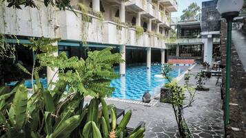 2 outdoor pools, open 6:00 AM to 8:00 PM, pool umbrellas, pool loungers