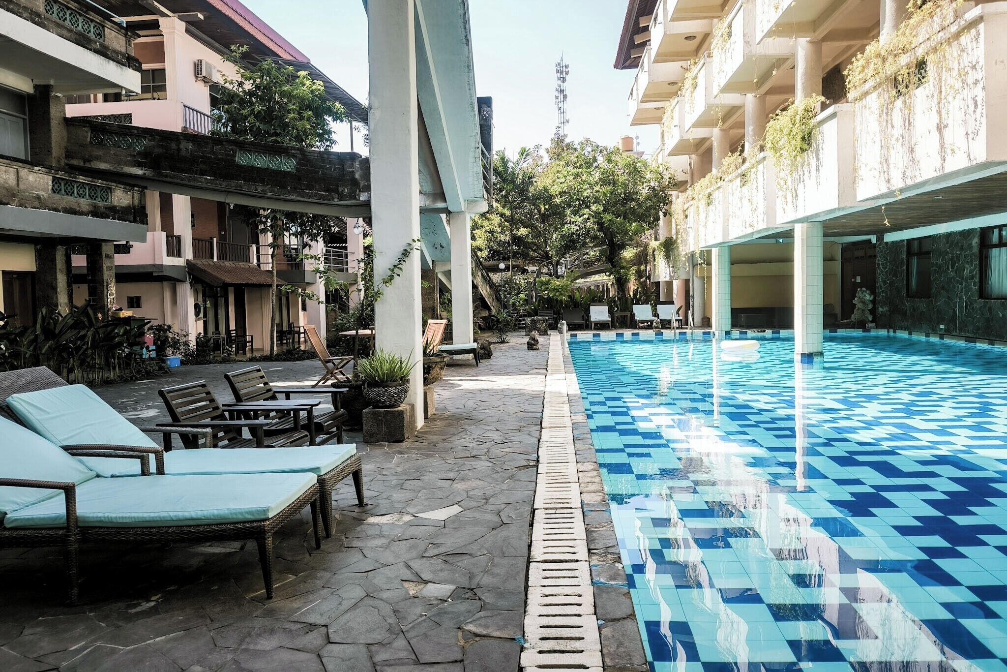 2 outdoor pools, open 6:00 AM to 8:00 PM, pool umbrellas, pool loungers