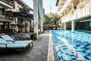 2 outdoor pools, open 6:00 AM to 8:00 PM, pool umbrellas, sun loungers -  Melasti Kuta Beach Hotel and Spa (Kuta)
