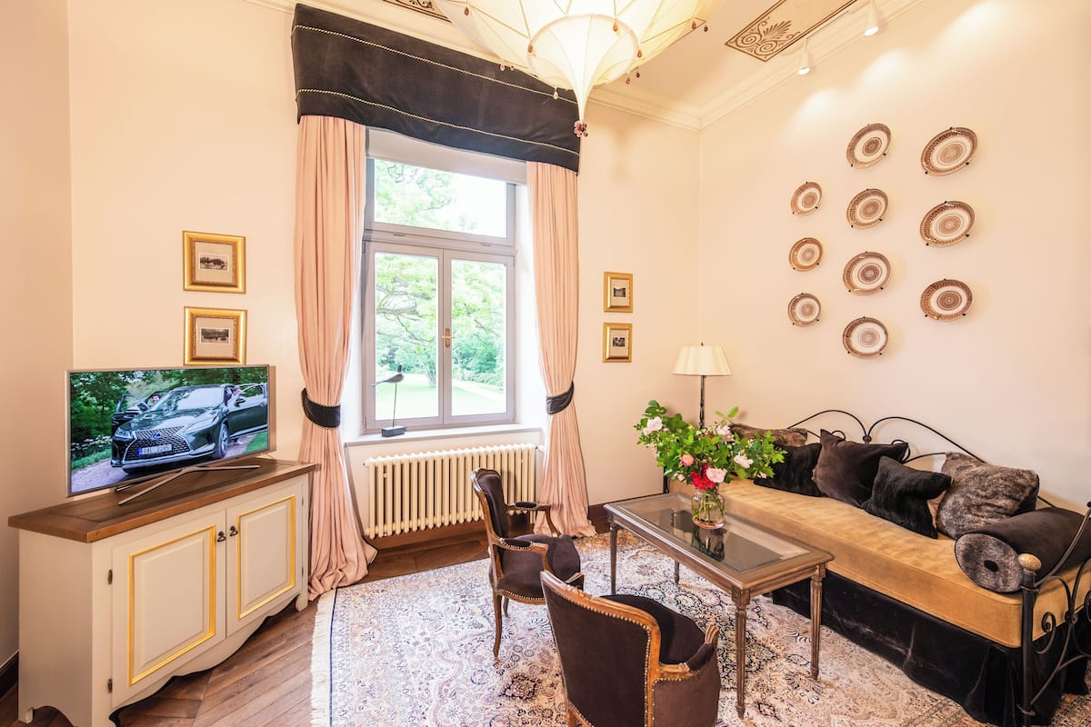 luxury suite | minibar, in-room safe, desk, iron/ironing board