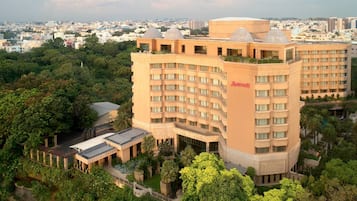 Experience the charm of this urban hotel, surrounded by lush greenery and a central courtyard.