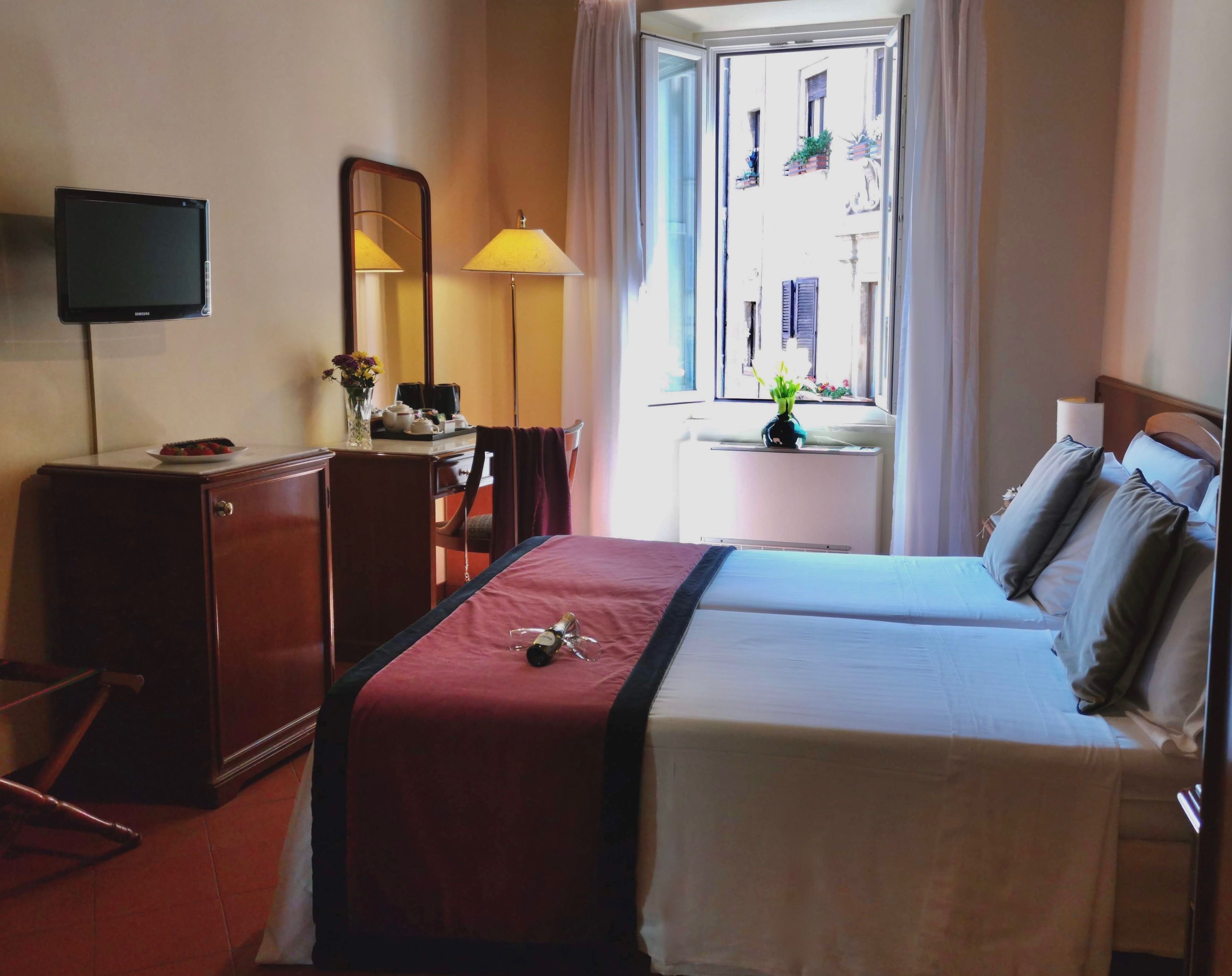 standard double or twin room | minibar, in-room safe, desk, blackout curtains