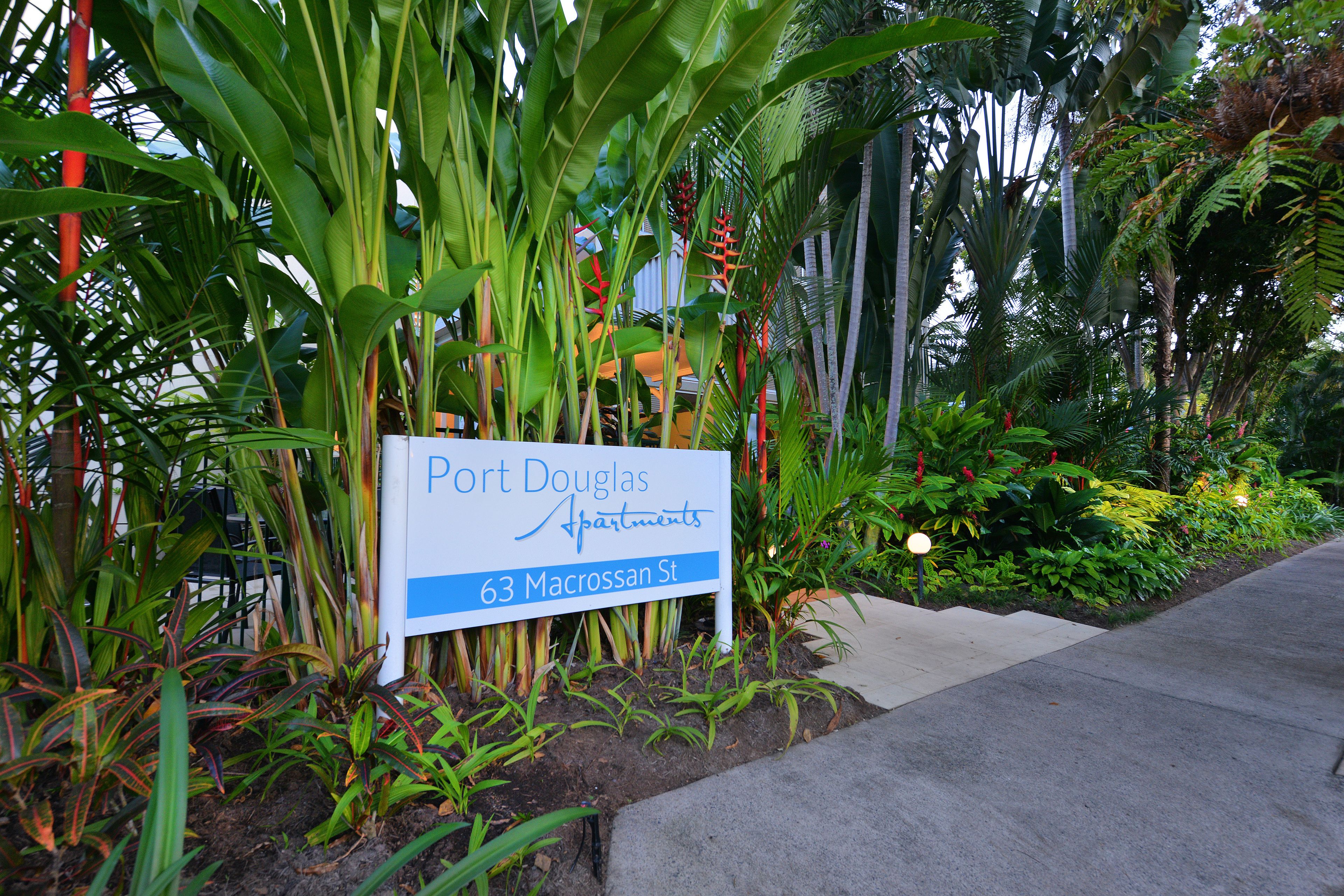 A sign for Port Douglas Apartments at 63 Macrossan St.