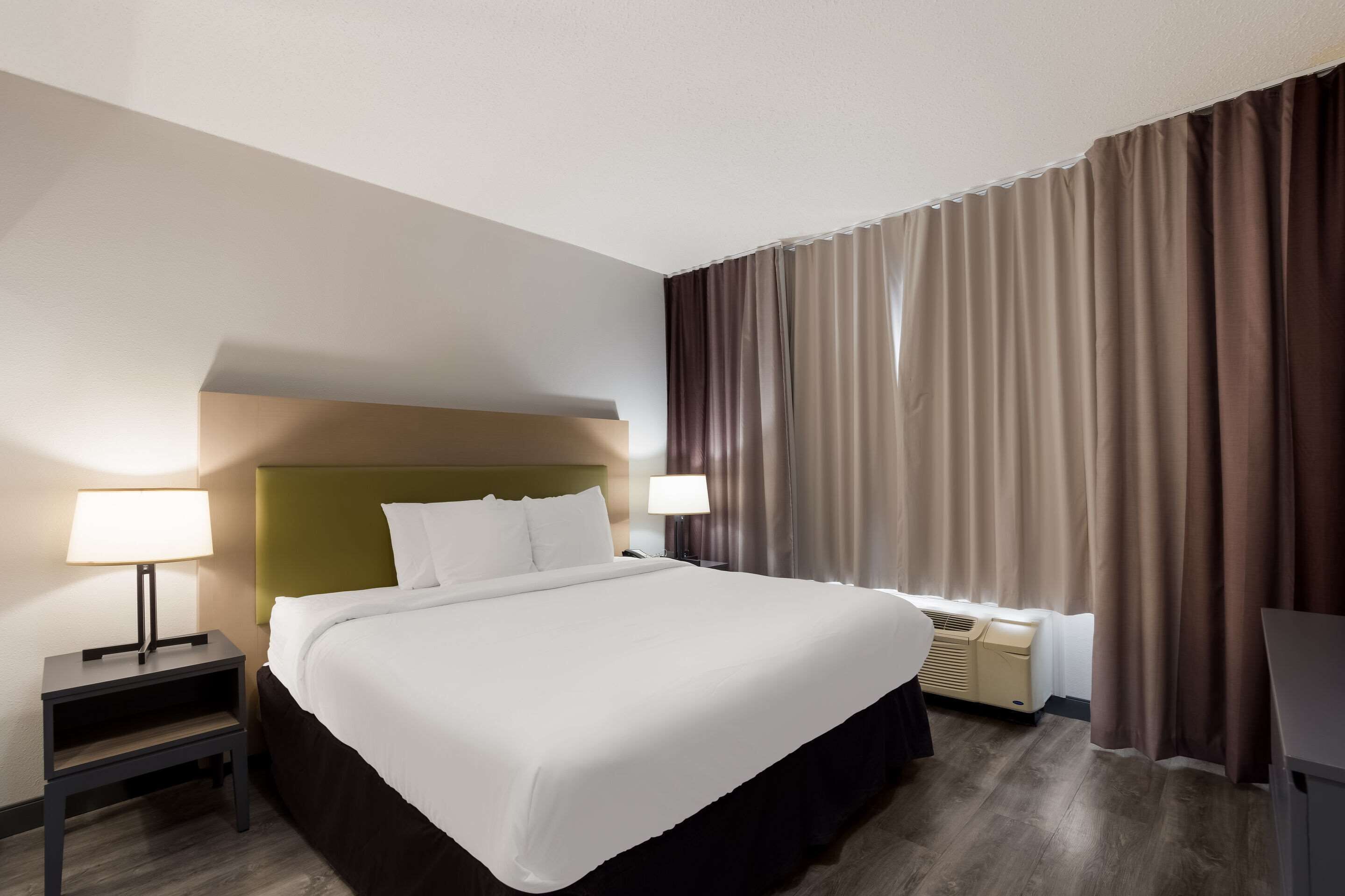 Premium bedding, down comforters, desk, laptop workspace