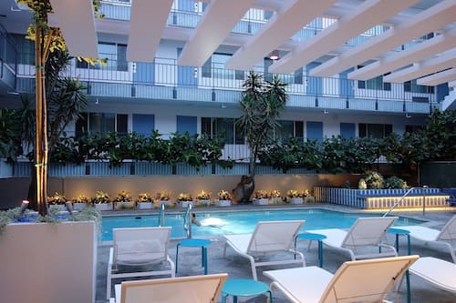 Outdoor pool, pool umbrellas, sun loungers