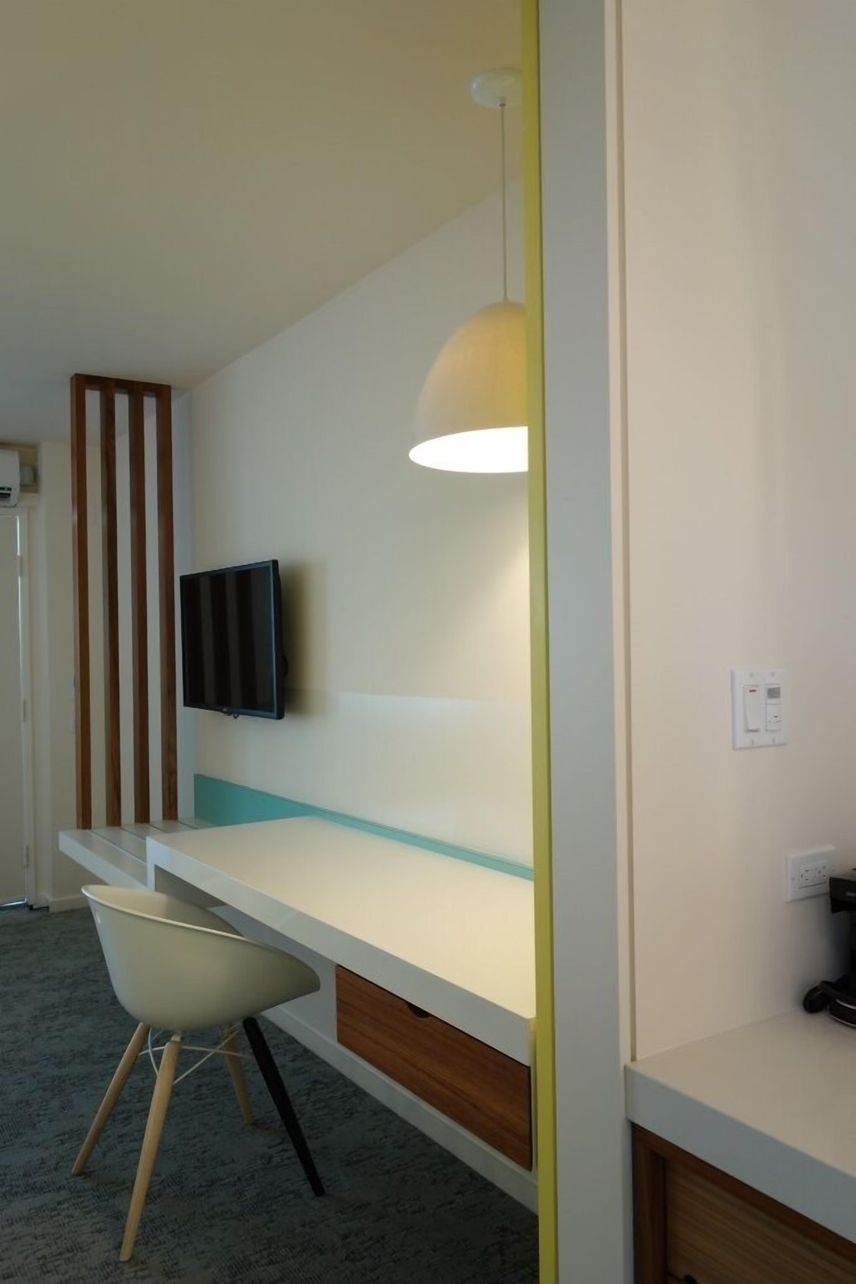 standard double room, 2 double beds | living area | 40-inch flat-screen tv with satellite channels, tv, ipod dock