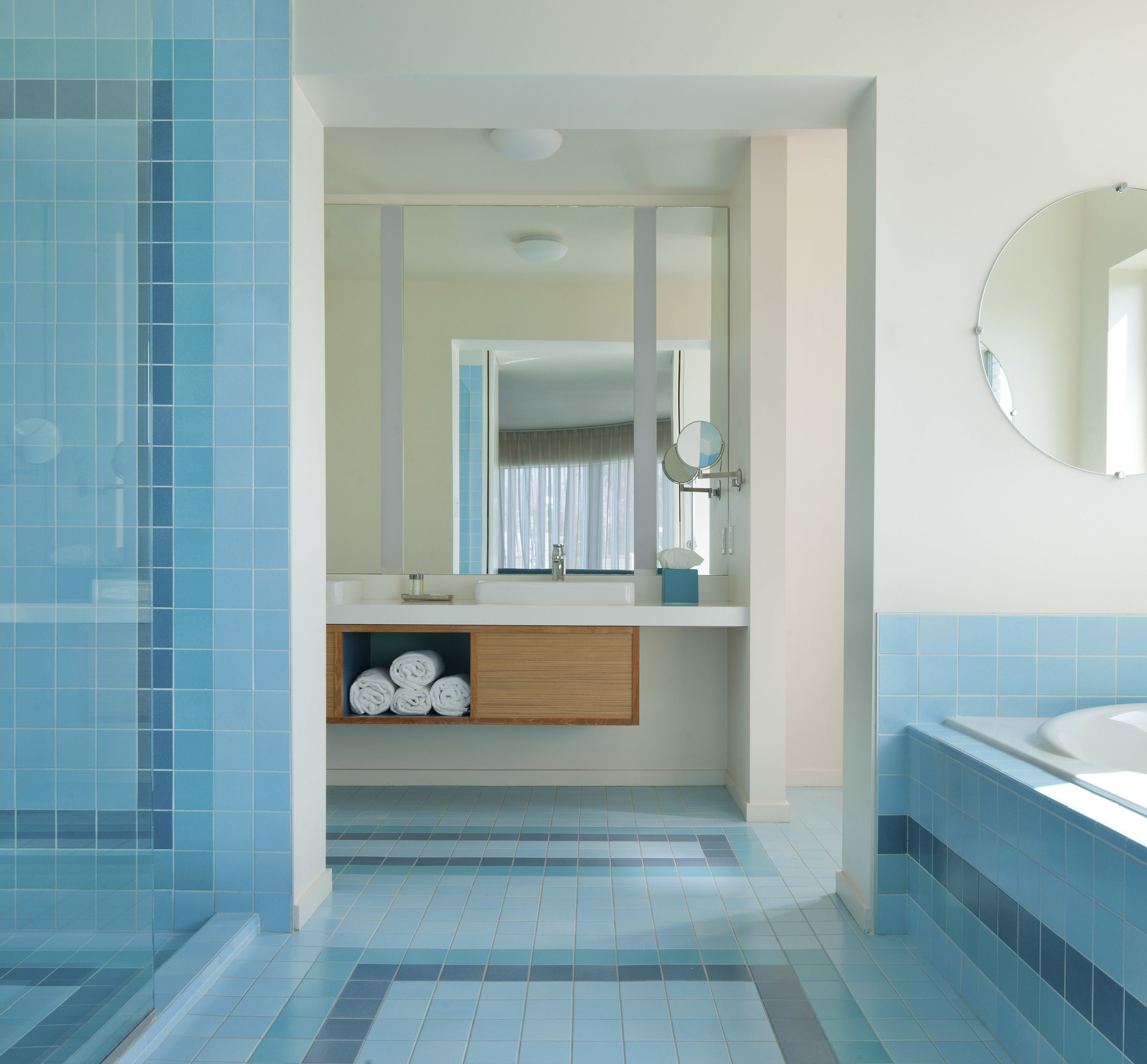 romantic suite (round bed) | bathroom | shower, designer toiletries, hair dryer, towels