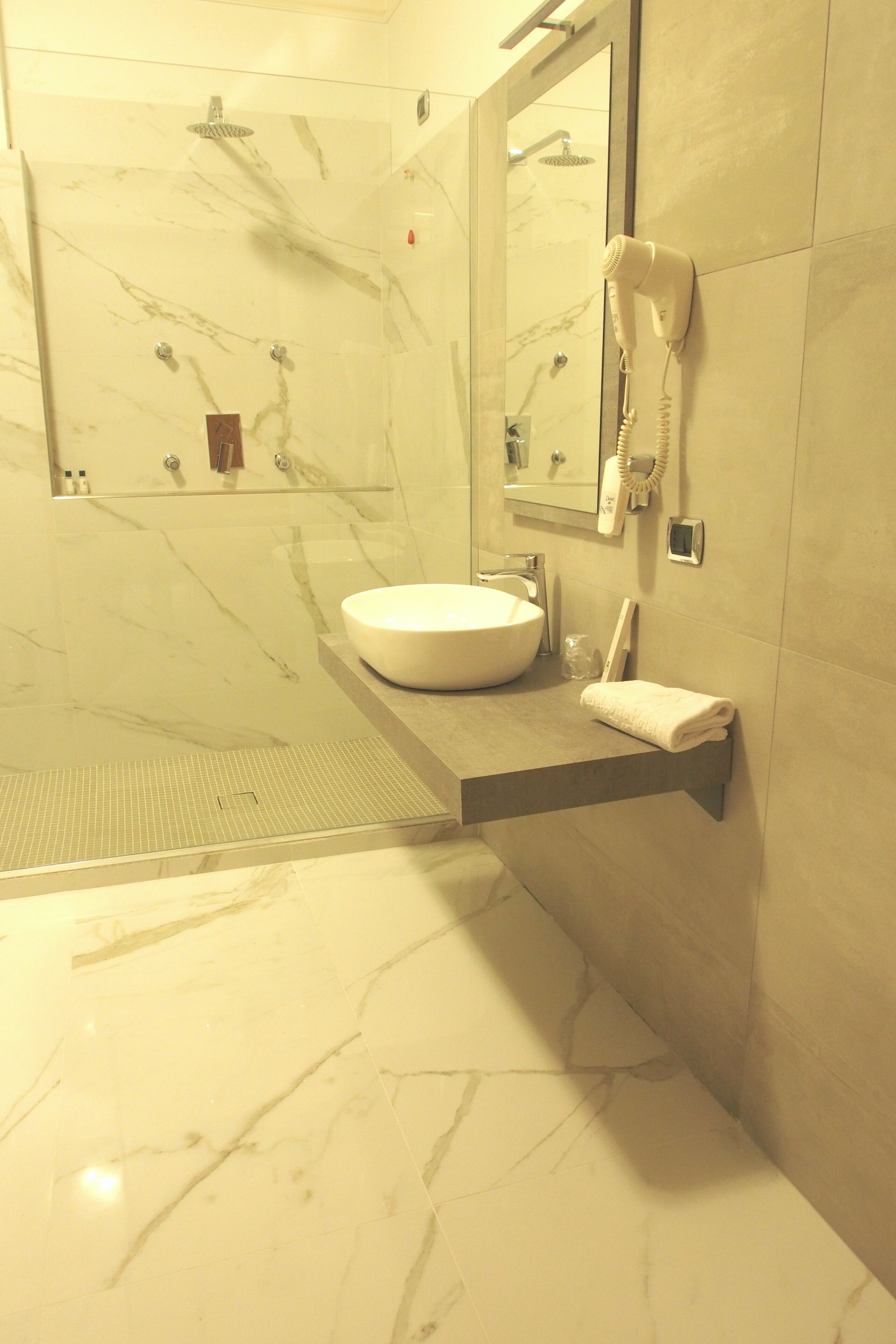 free toiletries, hair dryer, slippers, bidet