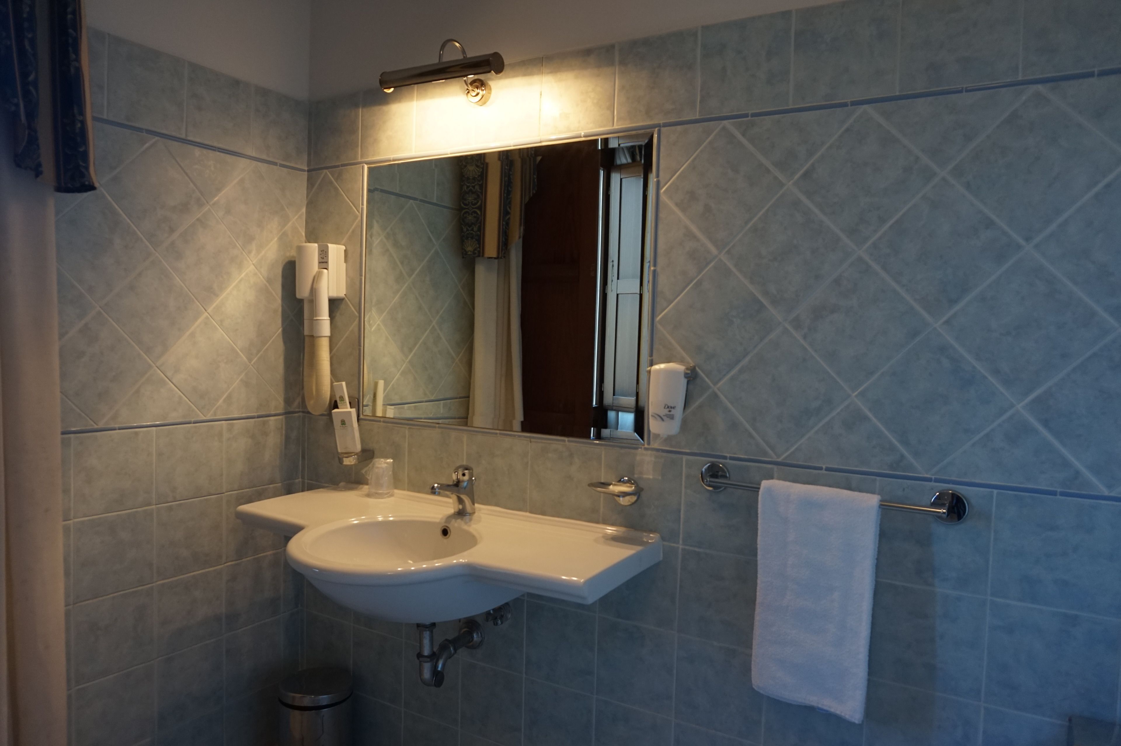 free toiletries, hair dryer, slippers, bidet