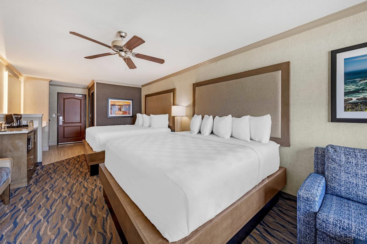 Suite, Multiple Beds, Non Smoking, Balcony | Desk, laptop workspace, iron/ironing board, free WiFi