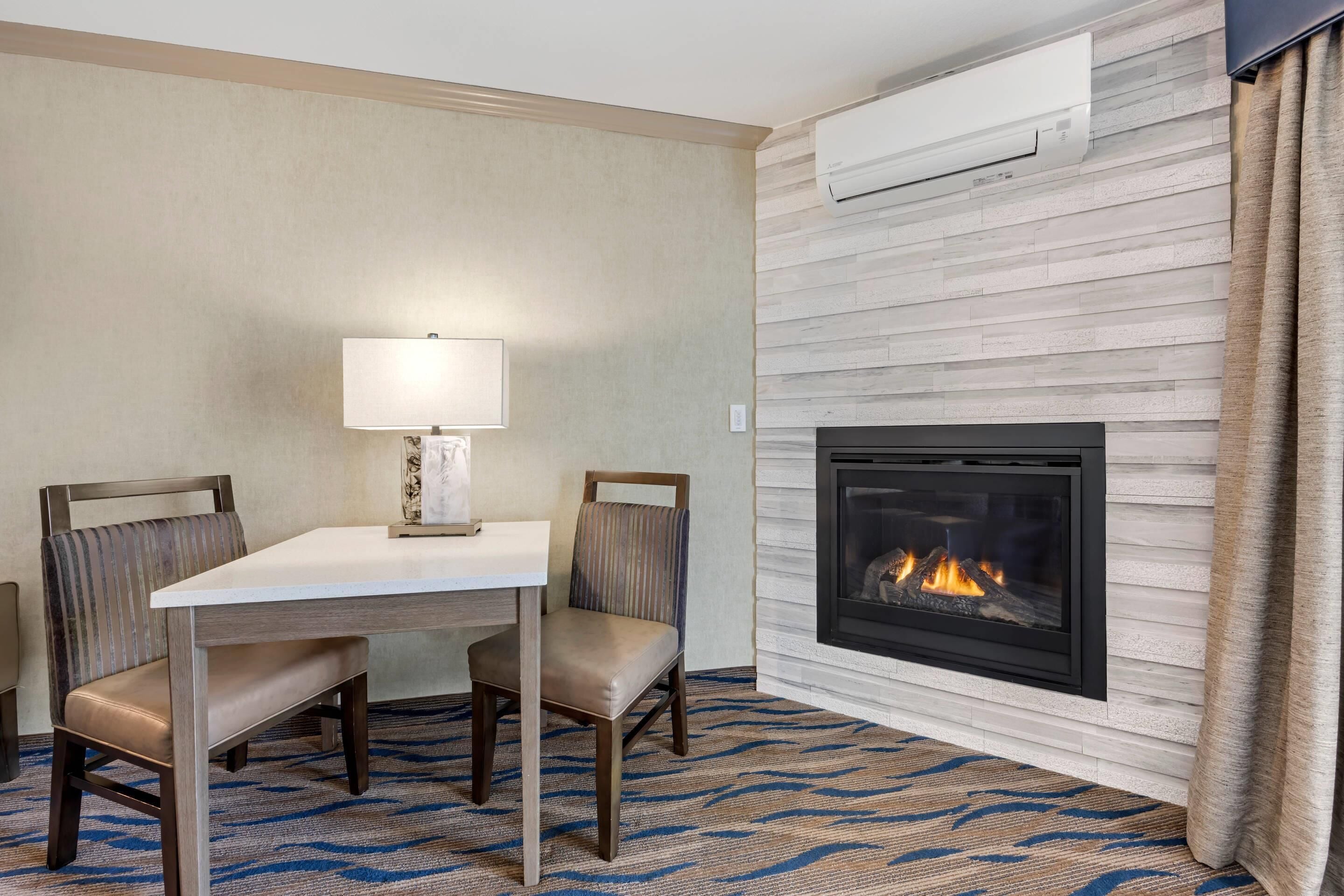 suite, 1 king bed with sofa bed, non smoking, corner (2 person sofabed) | desk, laptop workspace, iron/ironing board, free wifi