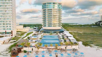 Enjoy access to a large pool area surrounded by sun loungers and umbrellas.