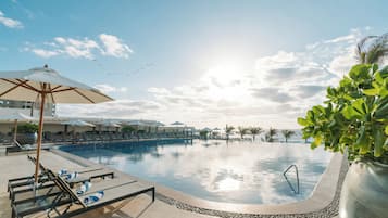 3 outdoor pools, cabanas (surcharge), pool umbrellas