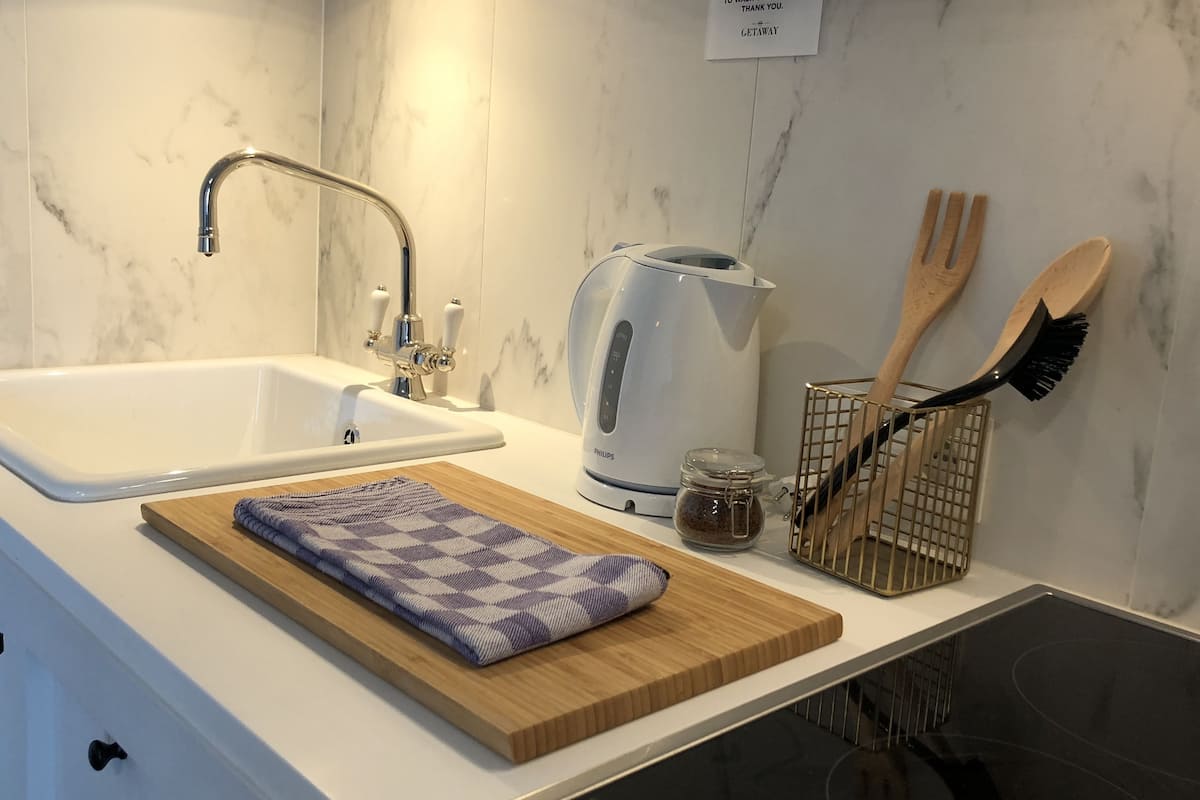 fridge, microwave, stovetop, electric kettle